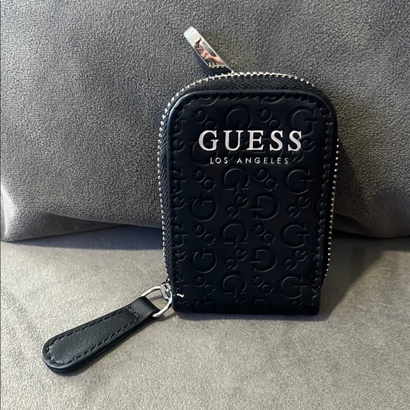 Guess Handbags - NWOT GUESS Black Logo Zip air pod case